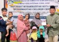 Penyerahan Bantuan dari Ketua dan Sekretaris Prodi, Hmj dan Alumni Program Studi Perbankan Syariah di Panti Asuhan anak bayi sehat Muhammadiyah